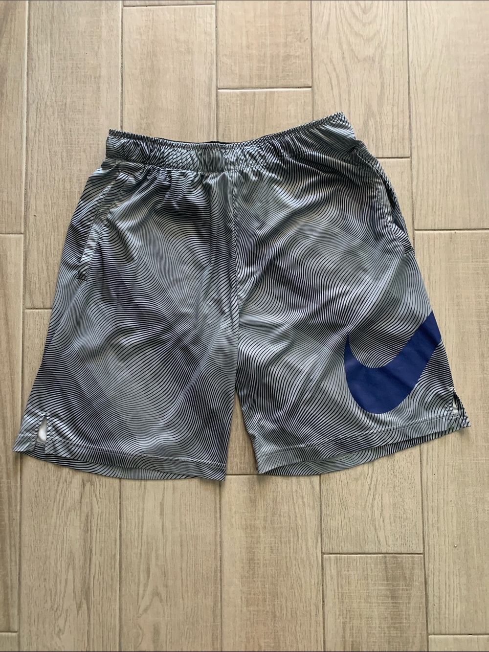 Nike Men’s Gray Athletic Shorts with Blue Swoosh - Size L